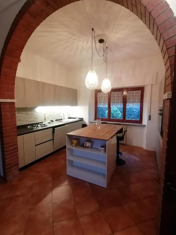 Kuchyň nebo kuchyňský kout v ubytování Villetta la Fortezza