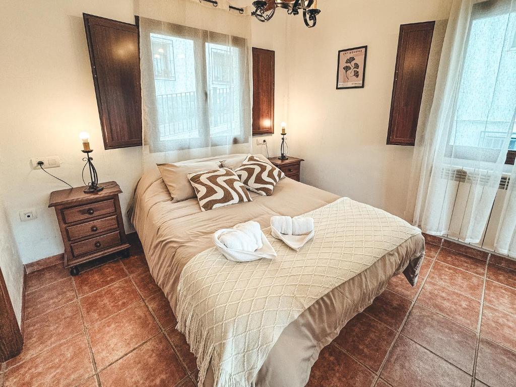 A bed or beds in a room at El Vergel de Berchules