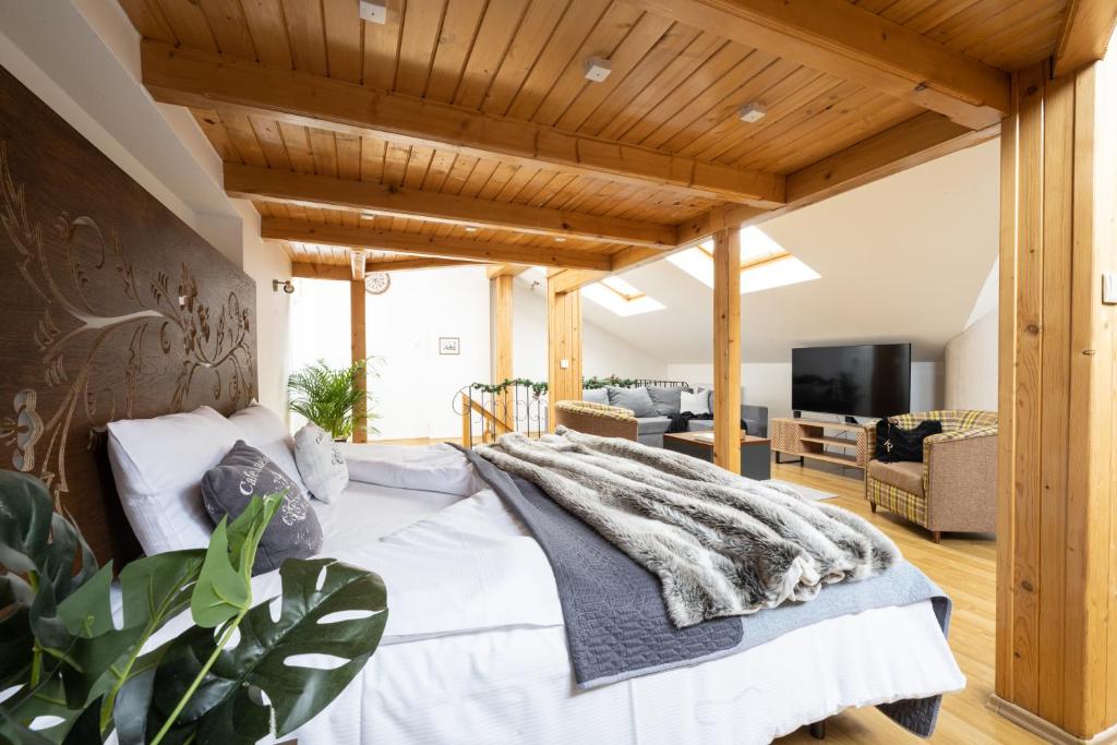 Posteľ alebo postele v izbe v ubytovaní Apartament Grand Krupówki 47