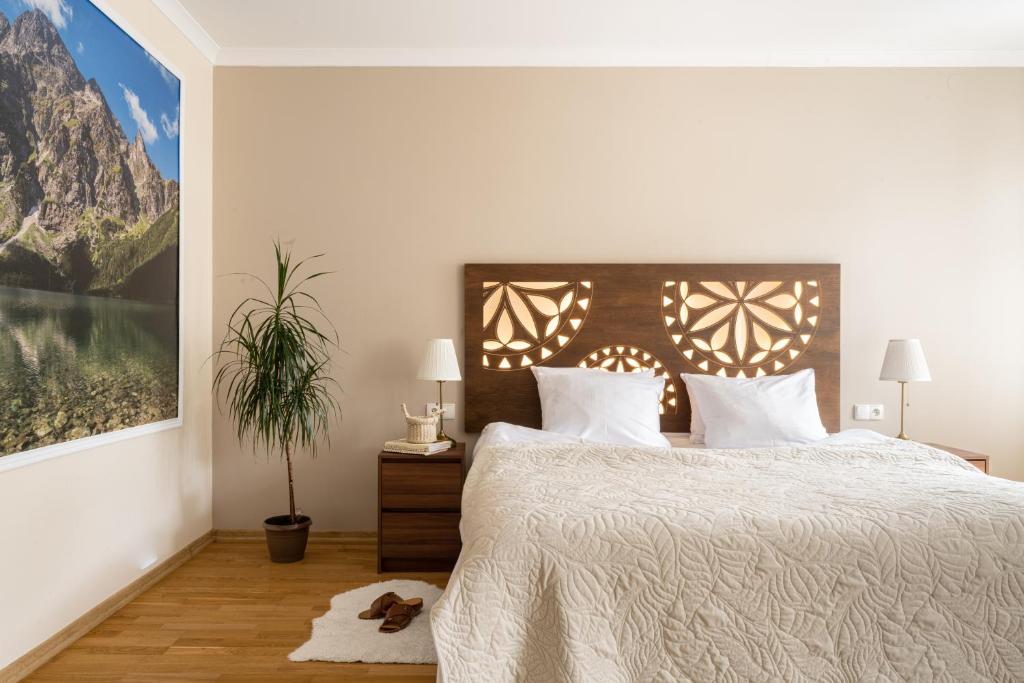 Posteľ alebo postele v izbe v ubytovaní Apartament Grand Krupówki 47
