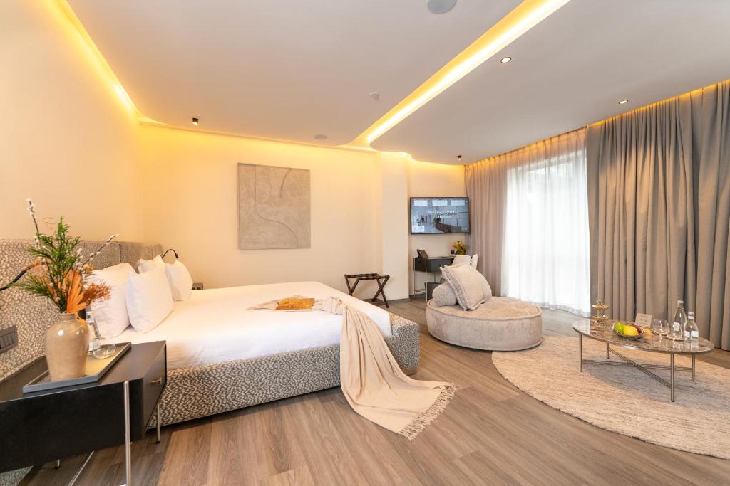 Letto o letti in una camera di Suites By Le Rêve