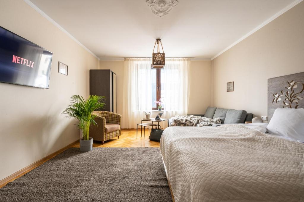 Posteľ alebo postele v izbe v ubytovaní Apartament Grand Krupówki 47