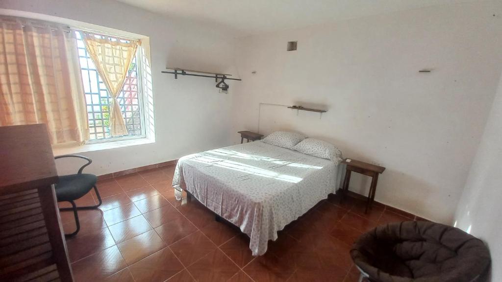 Postel nebo postele na pokoji v ubytování Casa 3 flamencos - estudio y apartamento