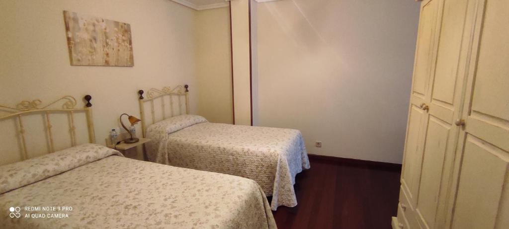 Postel nebo postele na pokoji v ubytování Saron Centro