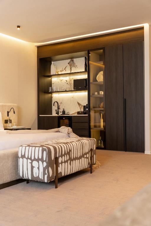 Letto o letti in una camera di Suites By Le Rêve