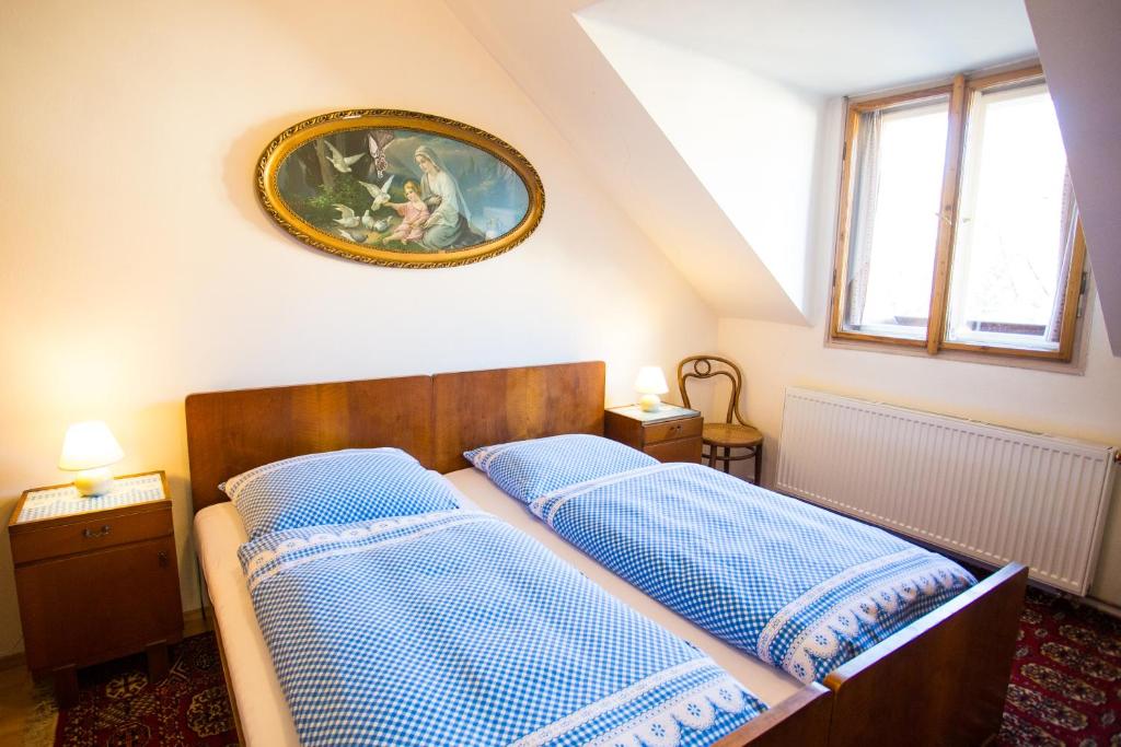 Postel nebo postele na pokoji v ubytování Penzion Ctrnactka