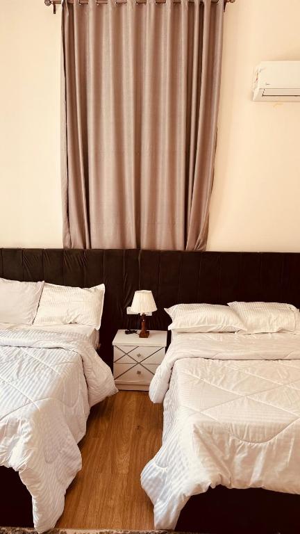 Postel nebo postele na pokoji v ubytování La Palaise du Caire