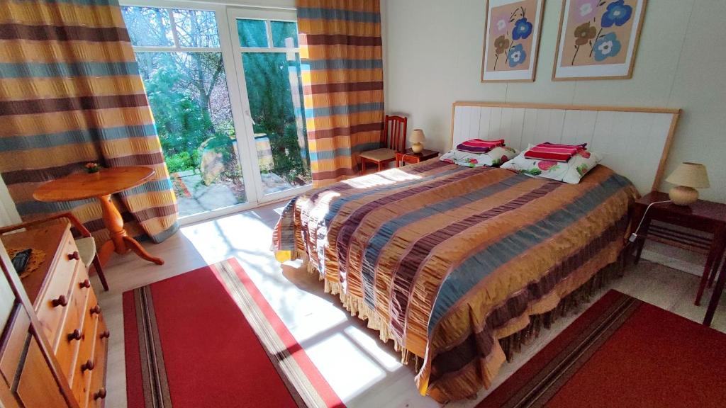 Postel nebo postele na pokoji v ubytování Villa Freven