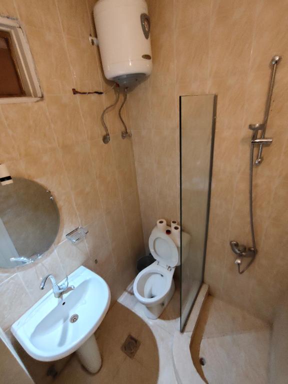 Koupelna v ubytování KR Hotel