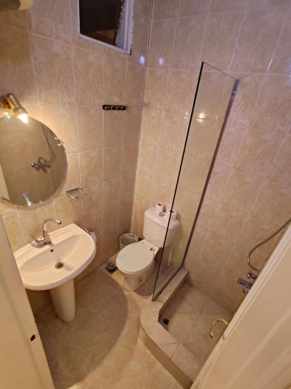 Koupelna v ubytování KR Hotel