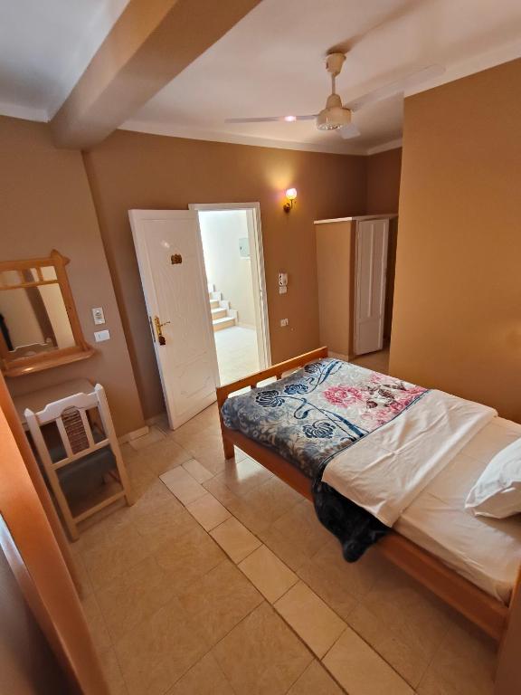 Postel nebo postele na pokoji v ubytování KR Hotel