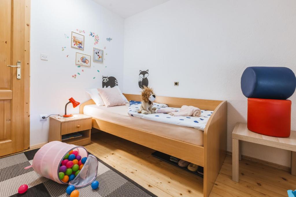 A bed or beds in a room at Rooms Zupančič