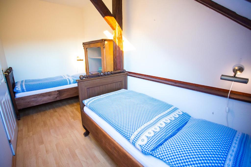 Postel nebo postele na pokoji v ubytování Penzion Ctrnactka
