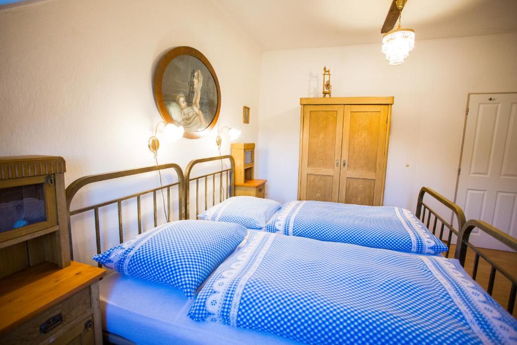 Postel nebo postele na pokoji v ubytování Penzion Ctrnactka