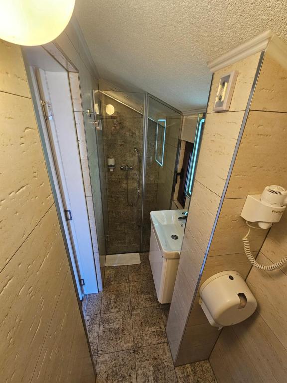 Koupelna v ubytování Hotel Bokeljski Dvori
