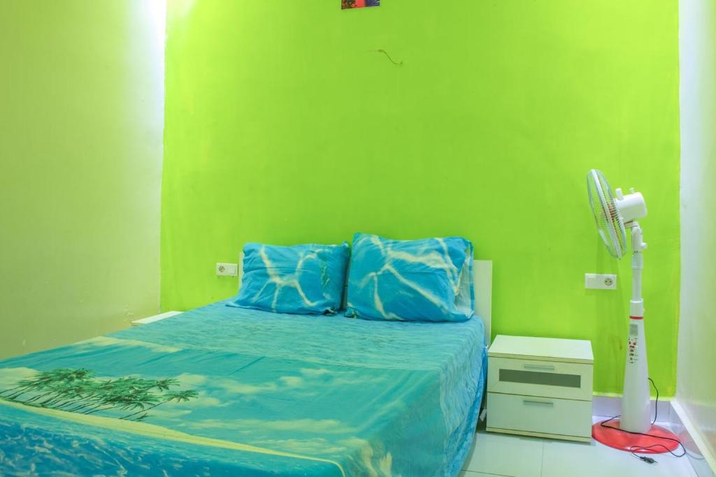 En eller flere senge i et værelse på Locameubles