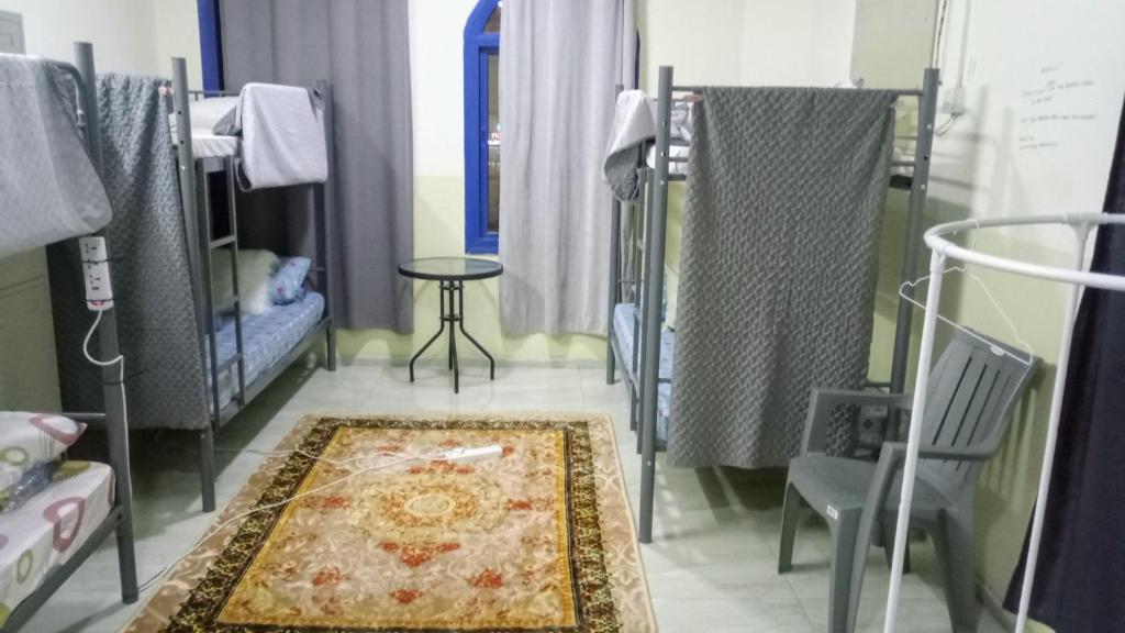 Postel nebo postele na pokoji v ubytování SALEM House Hostel Nizwa