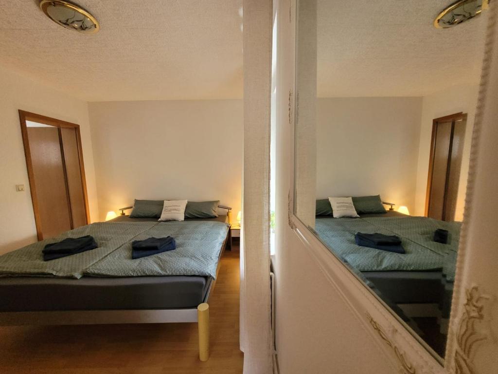 Postel nebo postele na pokoji v ubytování Haus Am Beckerberg im Harz