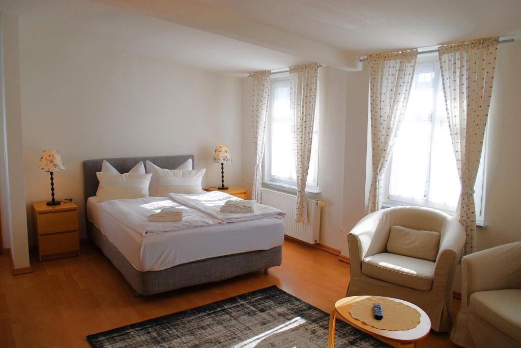 Ένα ή περισσότερα κρεβάτια σε δωμάτιο στο Villa Fortuna Gästehaus App Poel