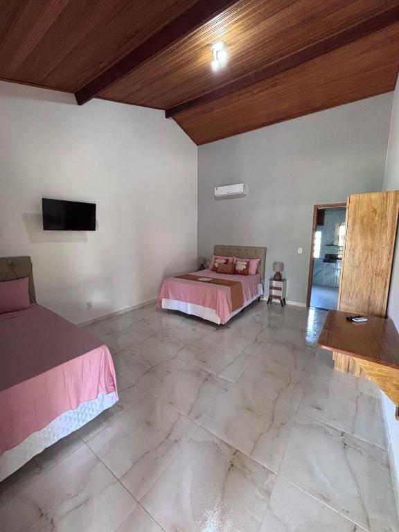 Postel nebo postele na pokoji v ubytování HOTEL FAZENDA BOLANDEIRA