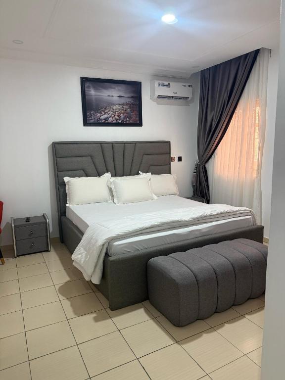 Postel nebo postele na pokoji v ubytování Molarans Place
