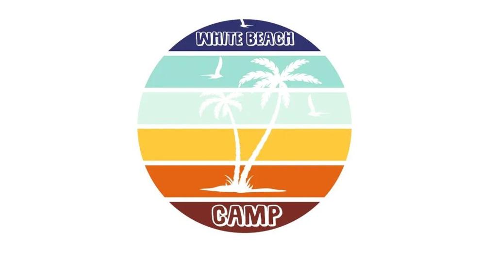 a skateboard with the colors of the white beach camp logo at The White Beach in Nuweiba