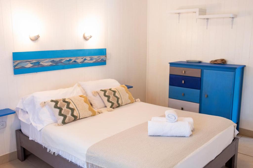 Postel nebo postele na pokoji v ubytování Boho lodge Montezuma l&l
