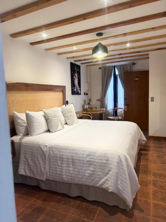 Postel nebo postele na pokoji v ubytování Casa Moseua