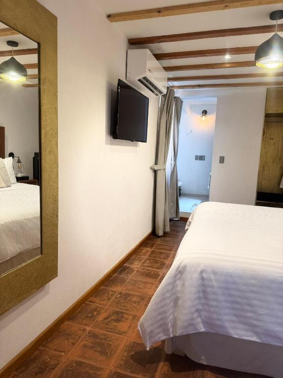 Postel nebo postele na pokoji v ubytování Casa Moseua