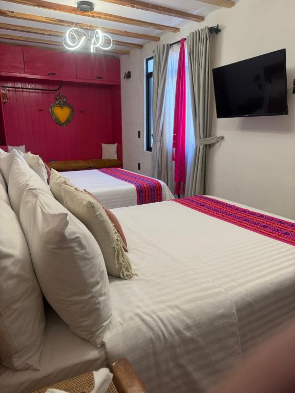 Postel nebo postele na pokoji v ubytování Casa Moseua