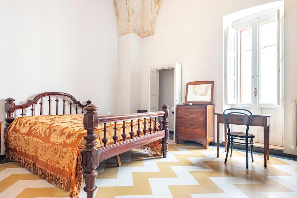 Postel nebo postele na pokoji v ubytování Casa dell'Arciprete Dimora storica