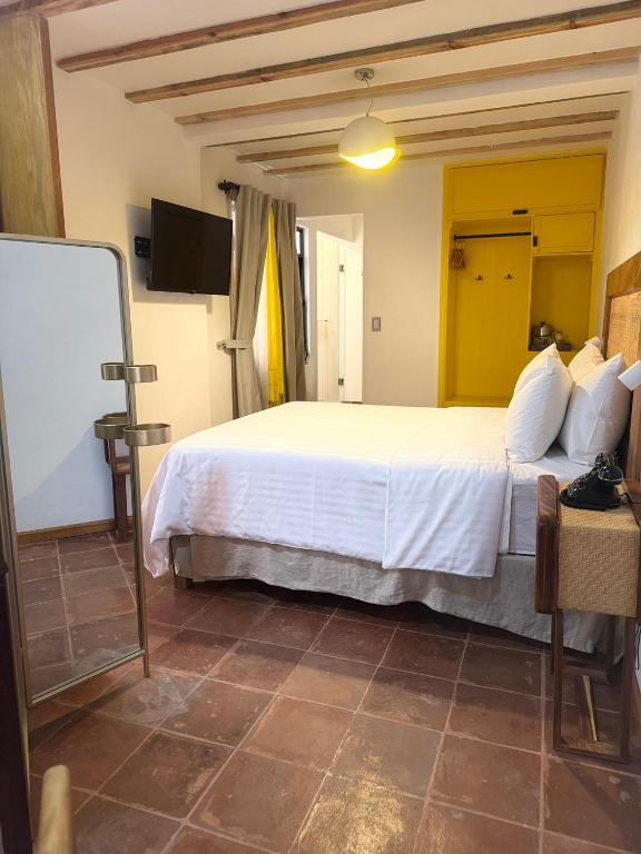Postel nebo postele na pokoji v ubytování Casa Moseua
