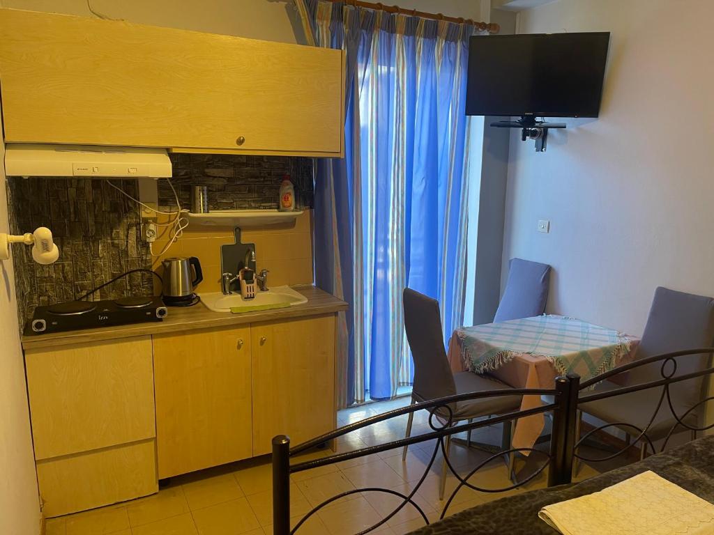 Kuchyň nebo kuchyňský kout v ubytování Pislis Rooms