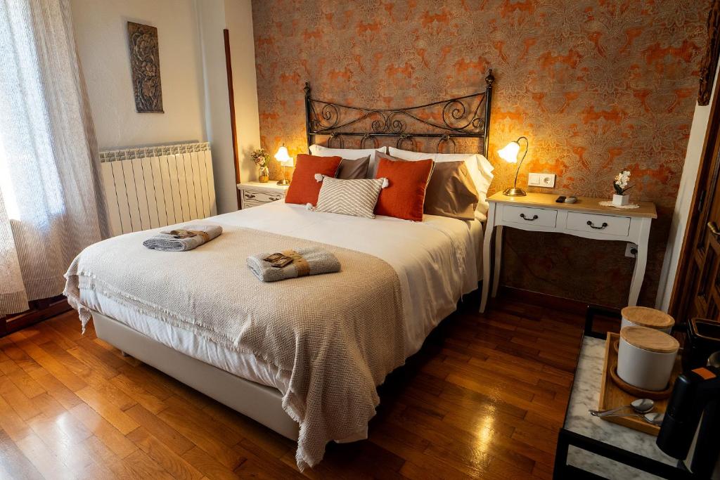 Postel nebo postele na pokoji v ubytování Albergue de peregrinos en CIRAUQUI - CASA MARALOTX Camino de Santiago