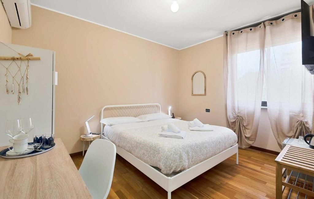 Postel nebo postele na pokoji v ubytování La Rosa del Golfo dei Poeti