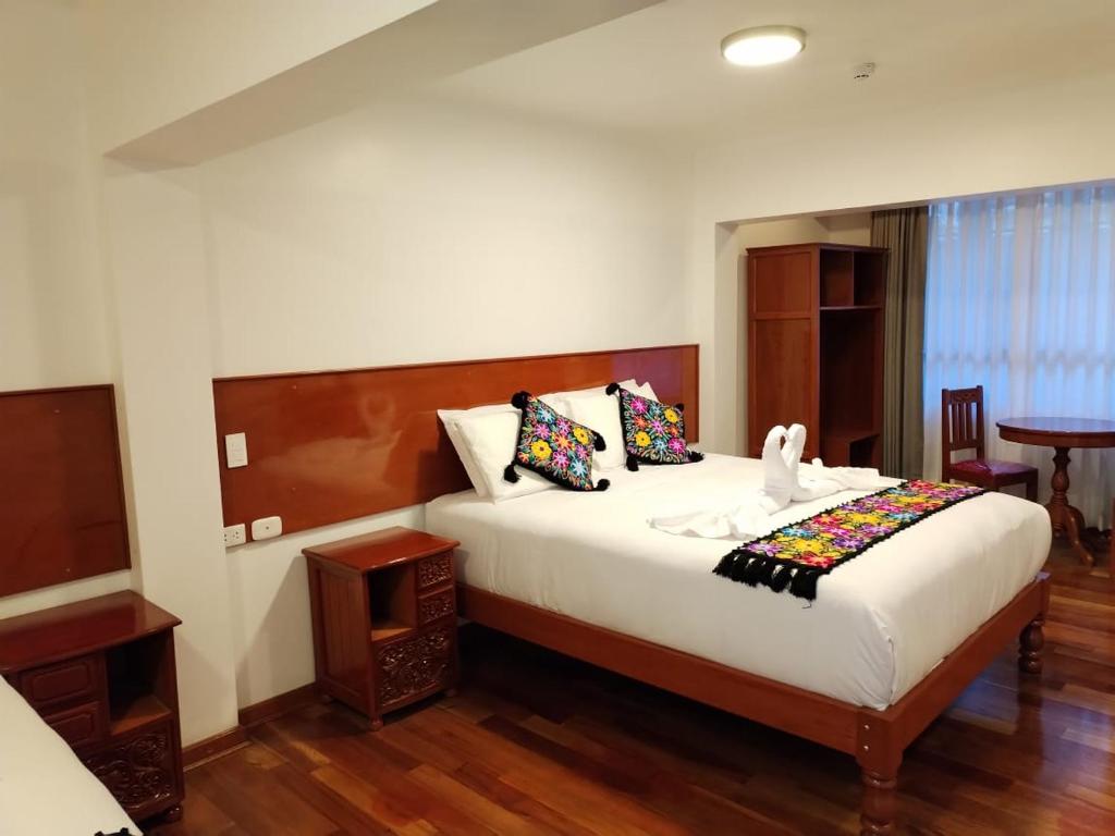 Kantu hotel客房内的一张或多张床位