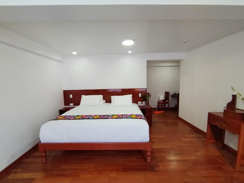 Kantu hotel客房内的一张或多张床位