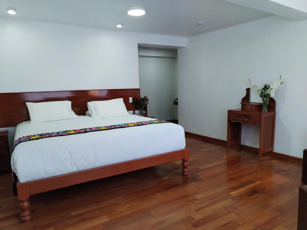 Kantu hotel客房内的一张或多张床位