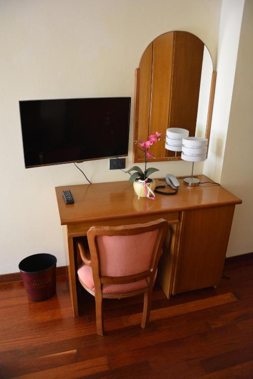 TV a/nebo společenská místnost v ubytování Hotel Giotto