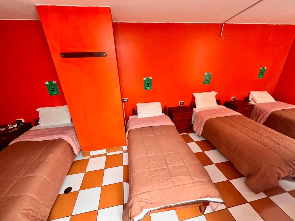 Postel nebo postele na pokoji v ubytování Sunrise Guest House