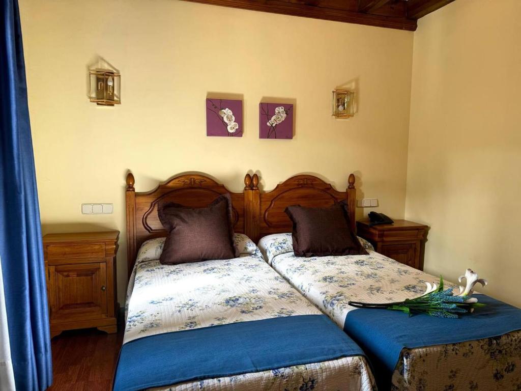 Postel nebo postele na pokoji v ubytování Hotel Las Farolas