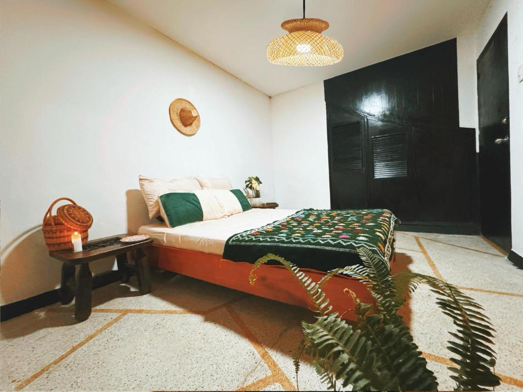 En eller flere senger på et rom på La Chiva Hostal Armenia