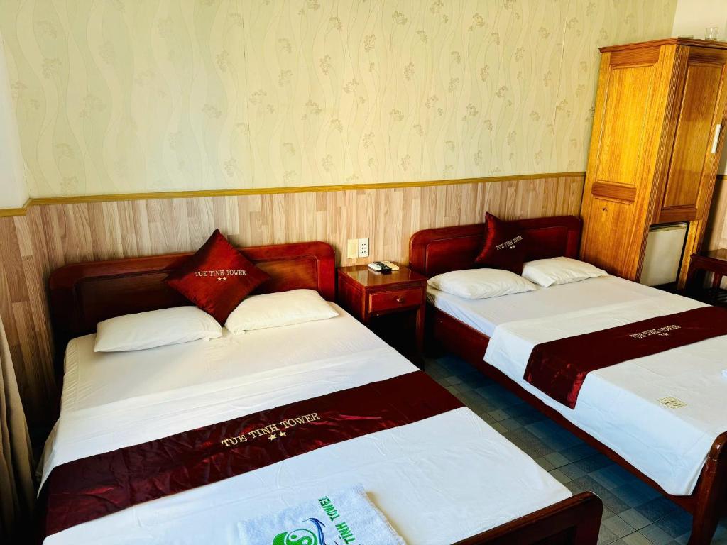 Postel nebo postele na pokoji v ubytování Tuệ Tĩnh