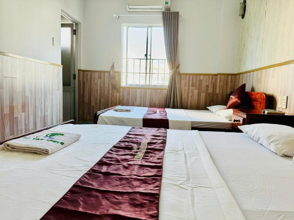 Postel nebo postele na pokoji v ubytování Tuệ Tĩnh
