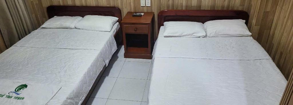 Postel nebo postele na pokoji v ubytování Tuệ Tĩnh