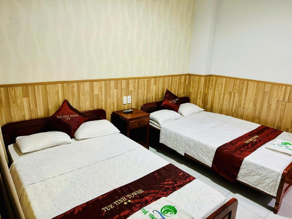 Postel nebo postele na pokoji v ubytování Tuệ Tĩnh