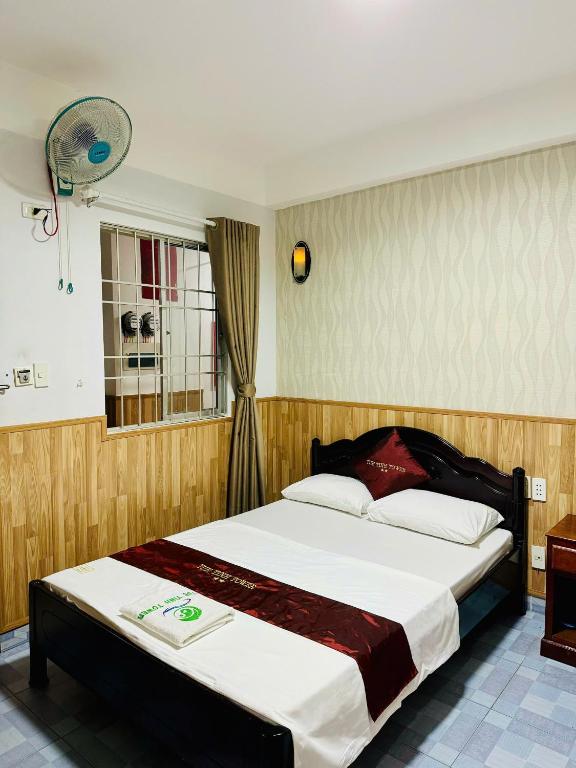 Postel nebo postele na pokoji v ubytování Tuệ Tĩnh