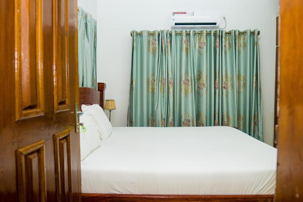 Voodi või voodid majutusasutuse Luxury Villa Ensuite Room 4 toas