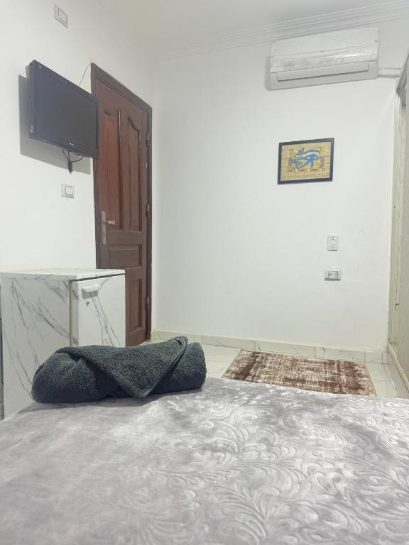 Postel nebo postele na pokoji v ubytování Loay pyramids inn