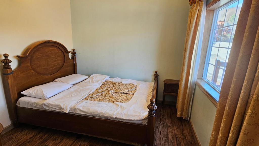 Postel nebo postele na pokoji v ubytování Elf Resort Hotel